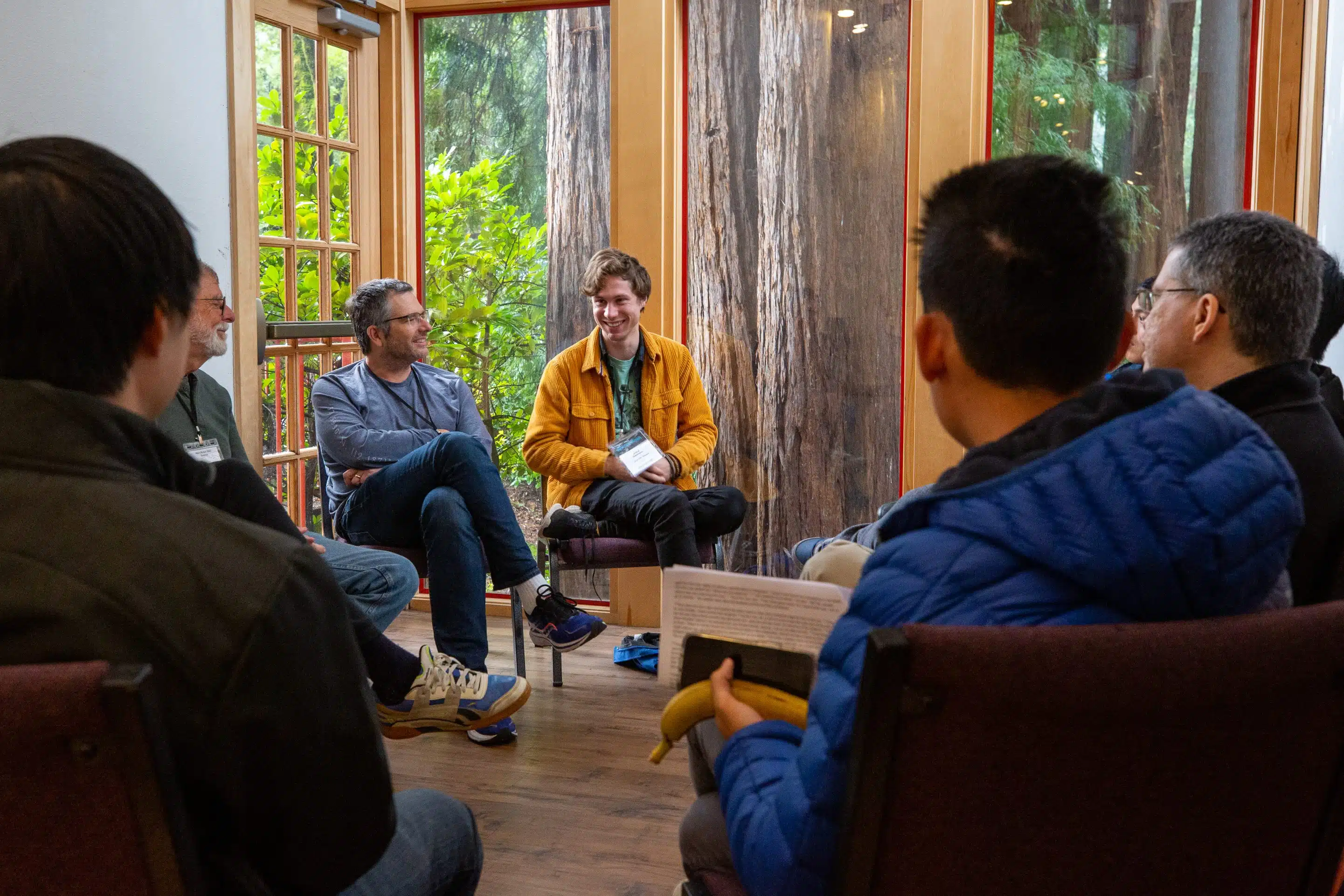 people gathering on couches