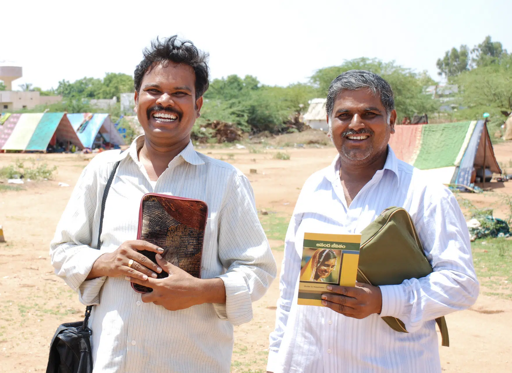 people praying over bible
