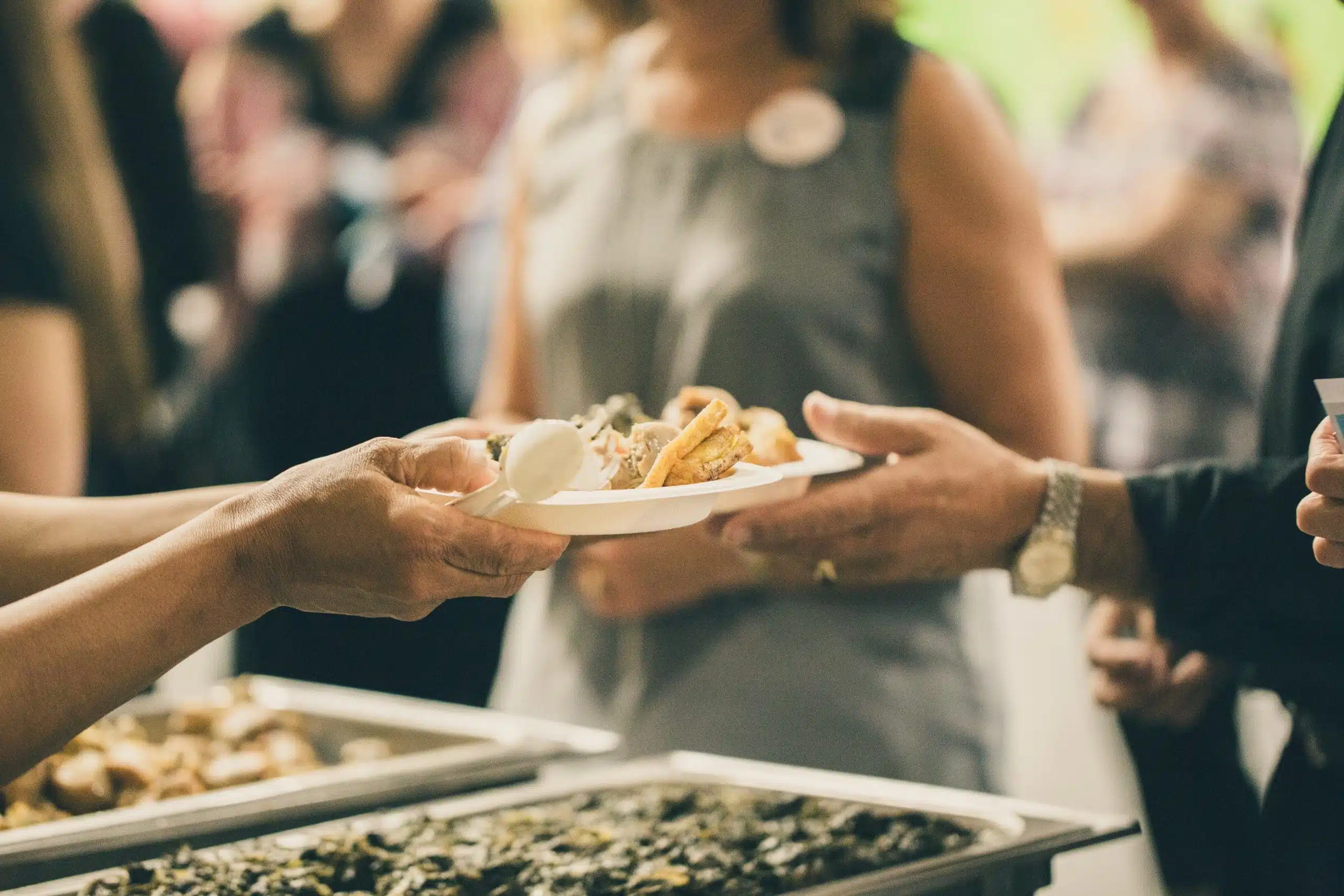 two people cooking together